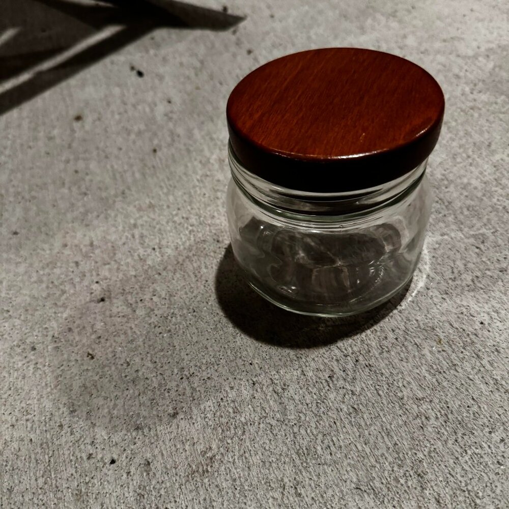 Vintage glass jar with wood lid